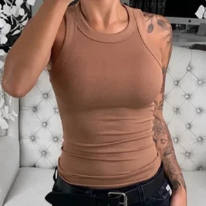 women solid round neck ribbed tank top